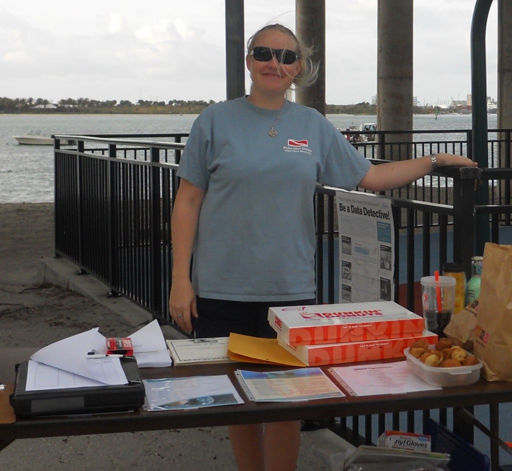 Shana signing volunteers in