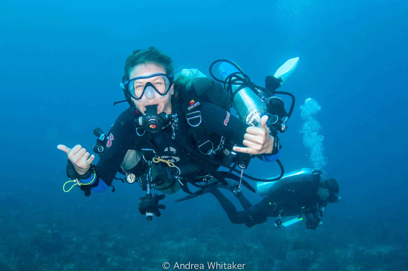 2 tec divers practicing an out of air scenario in the Tec Deep Course